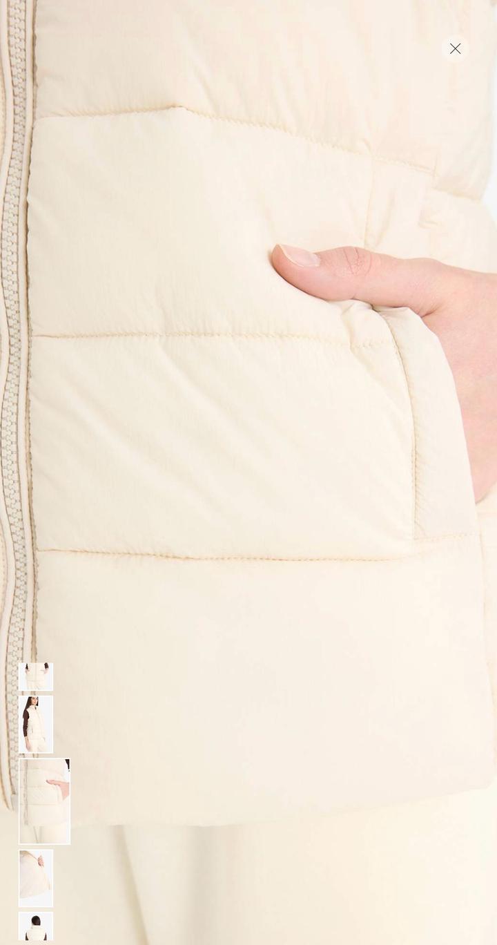 Жилетка безрукавка