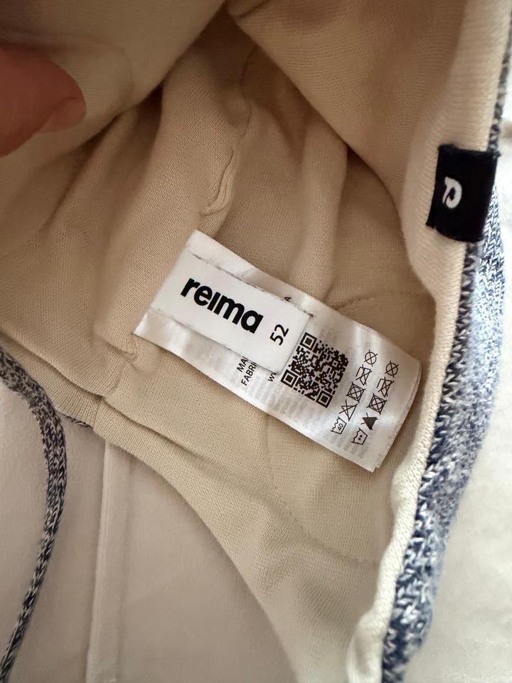 Продам шапку Reima