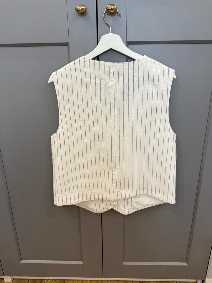 Продам льняную жилетку H&M