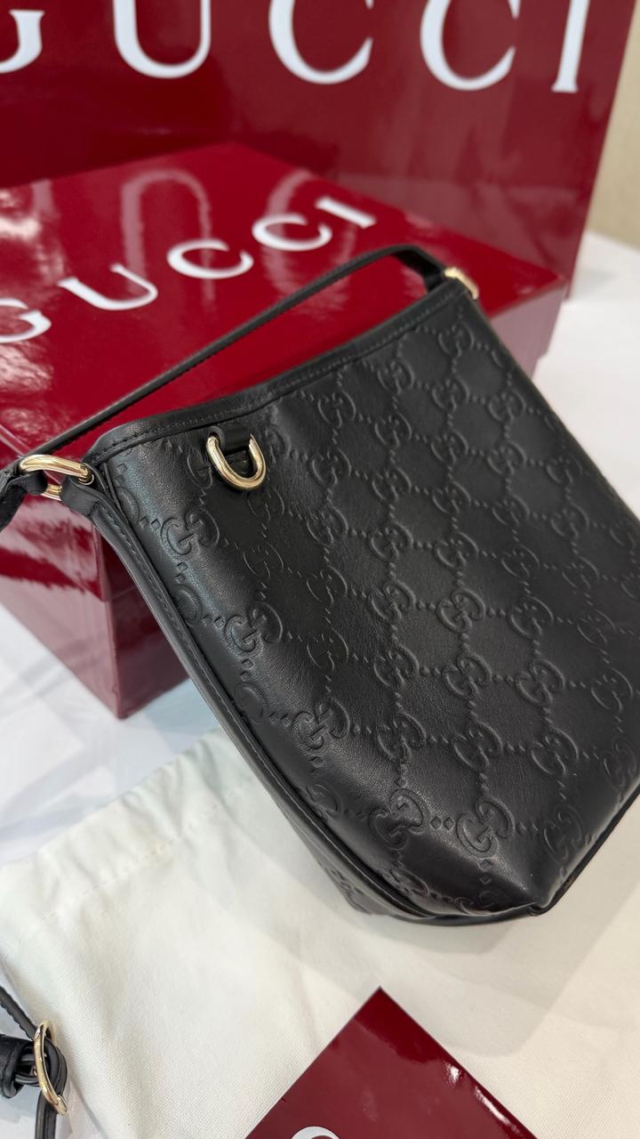 Сумка Gucci GG Emblem nano bucket bag