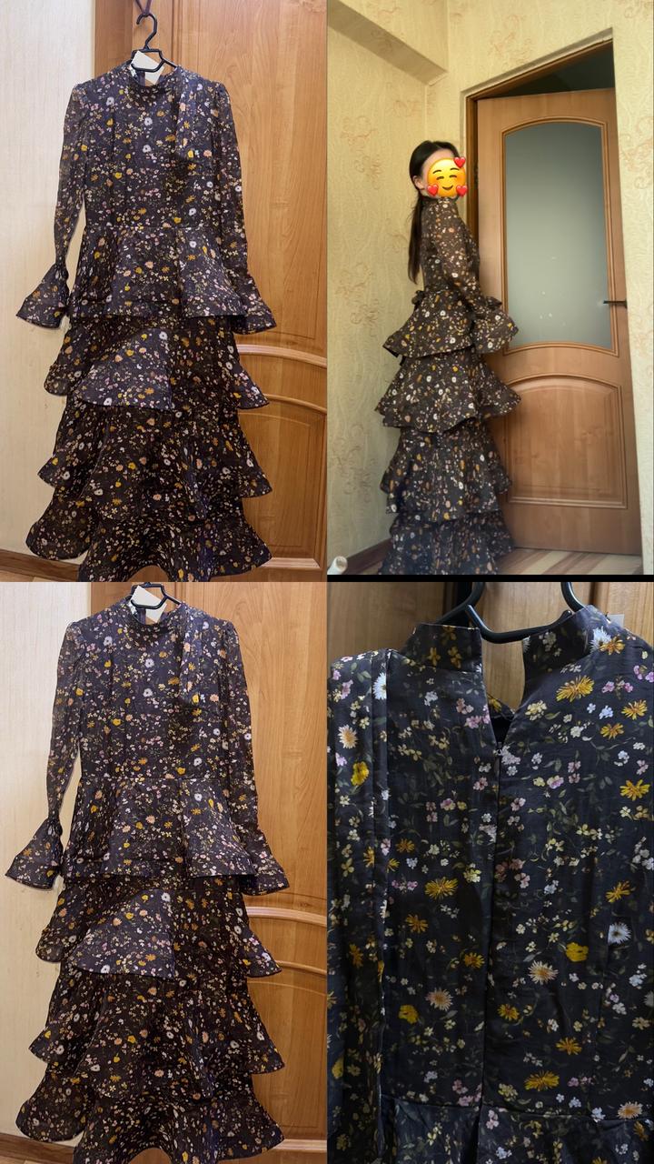 Новое платье с этикеткой.