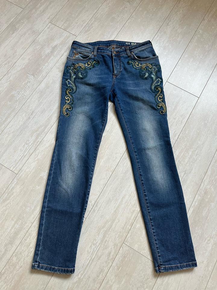 Джинсы Versace