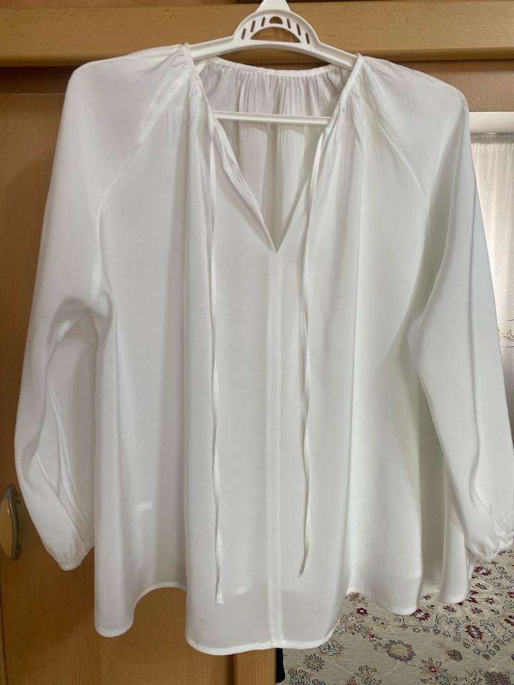 Белая блузка