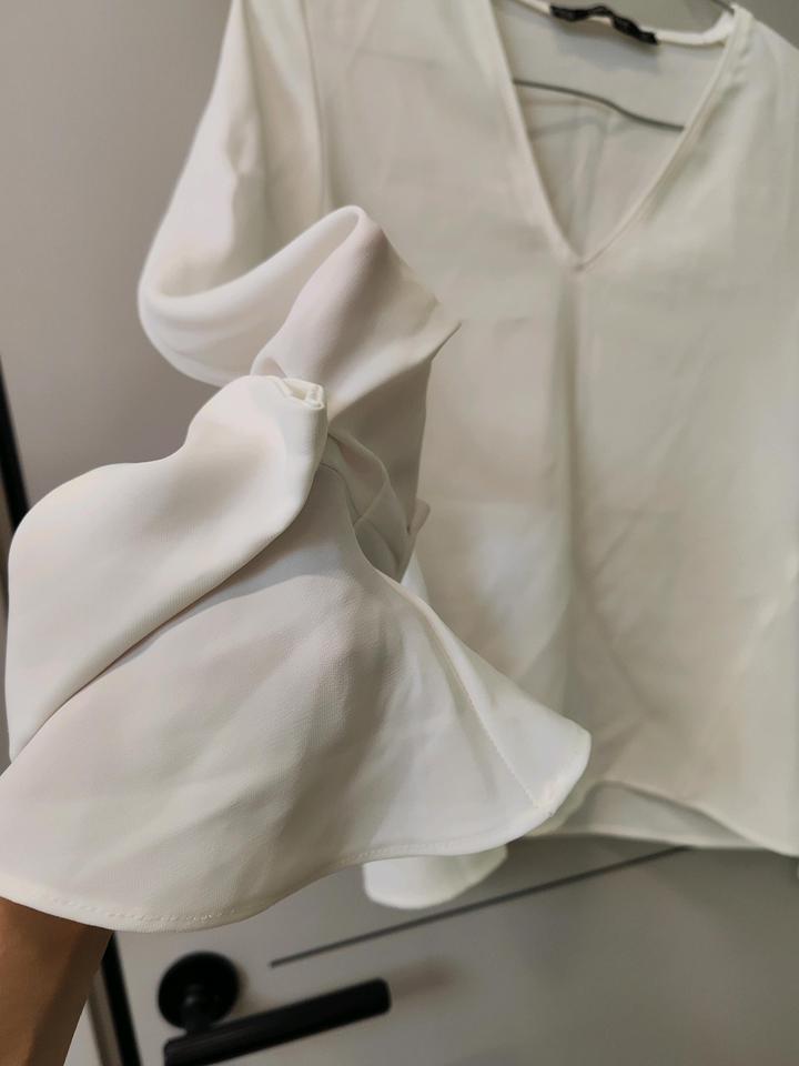 Блузка от Zara .