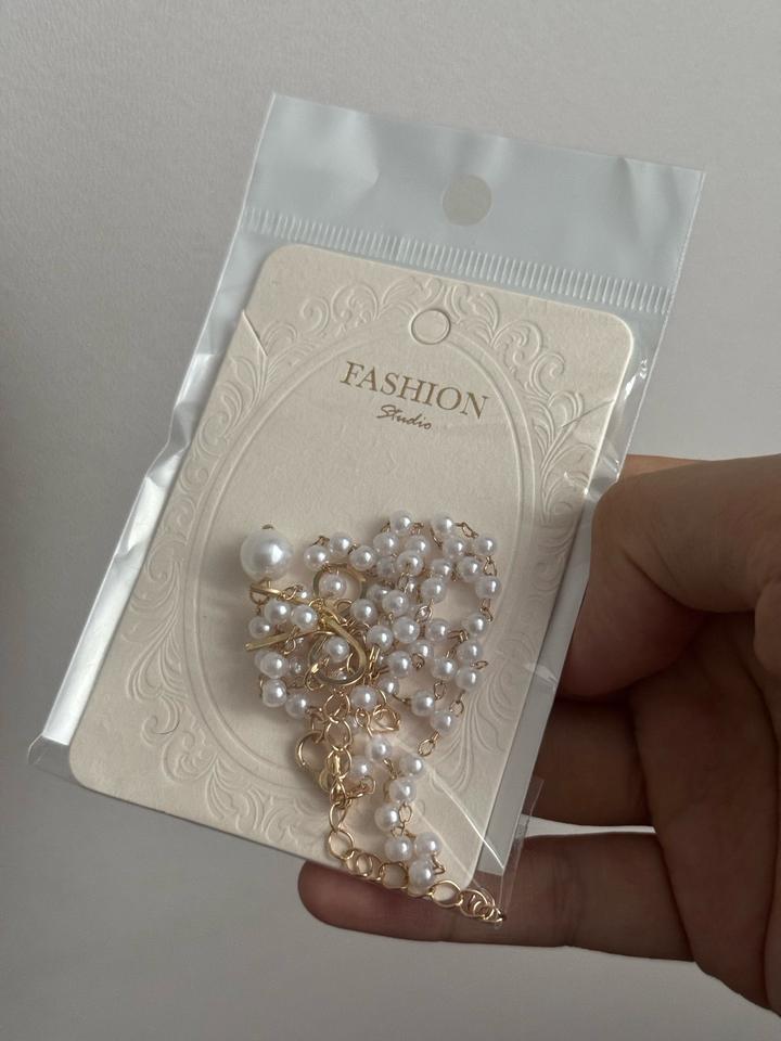 Колье из сплава с подвеской кулон бантик, жемчуг