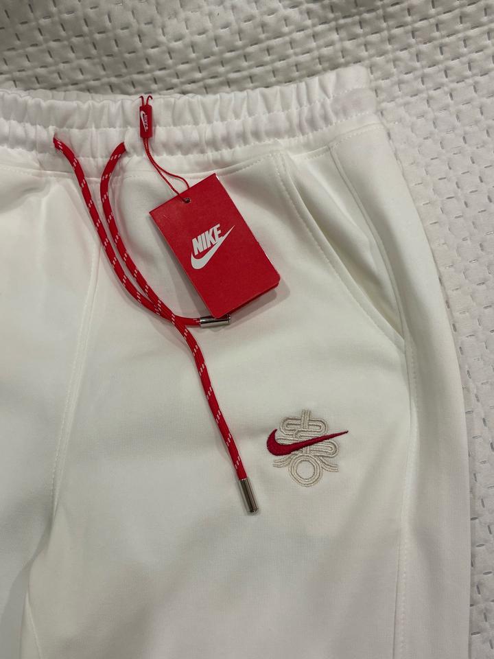 белые трико nike