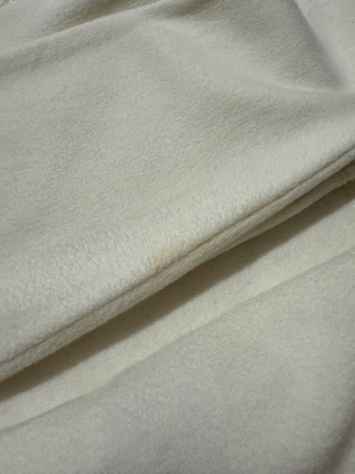 Белая водолазка Uniqlo