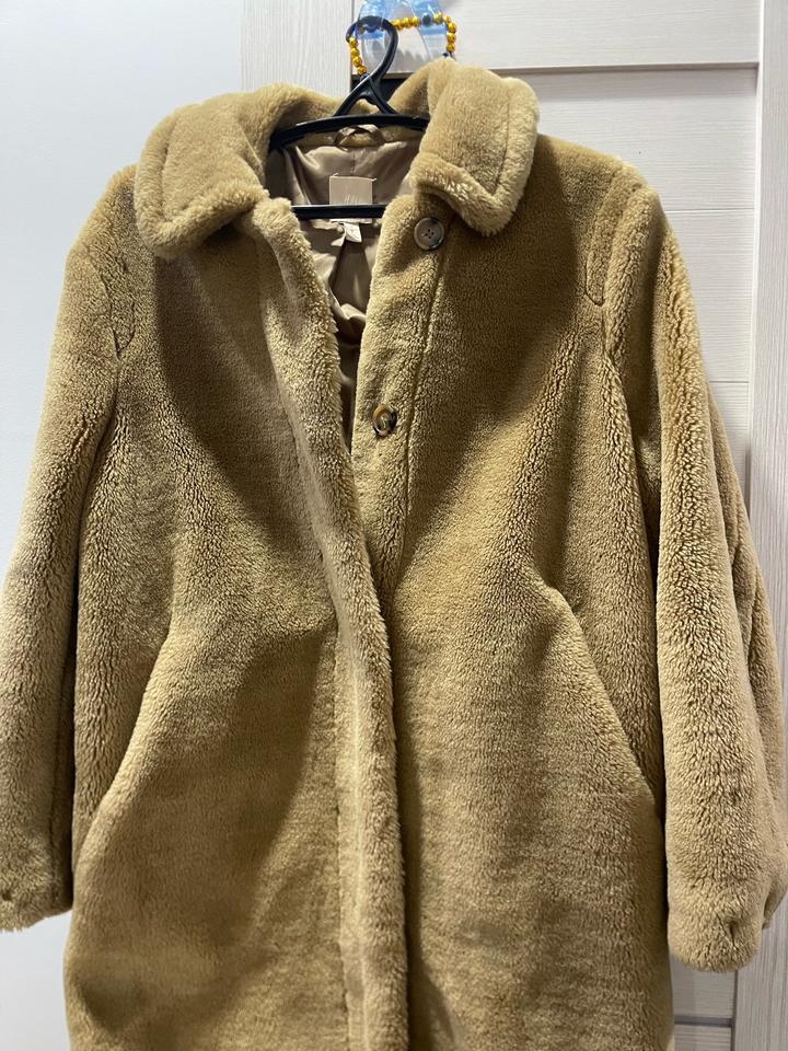 Песчанного цвета шуба овчина