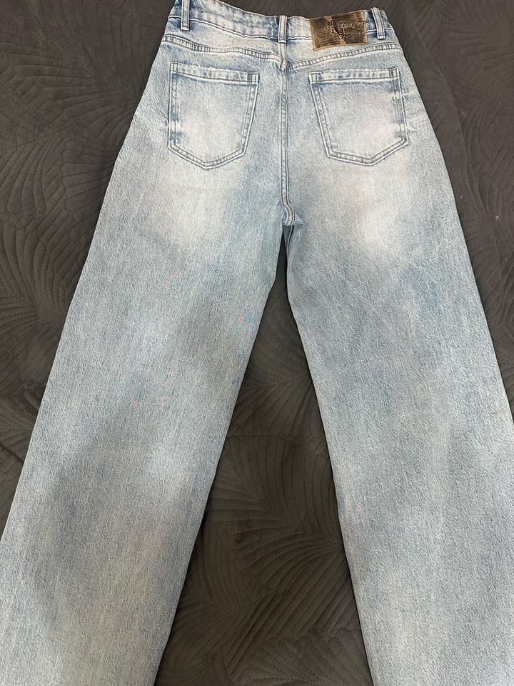 Джинсы новые