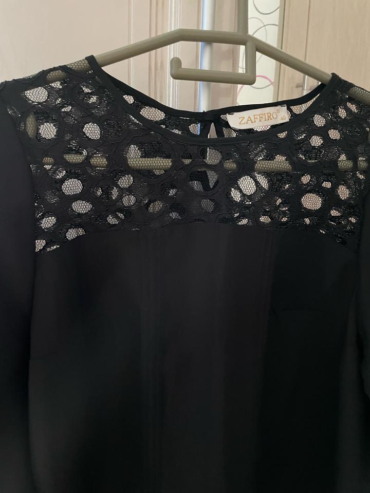 Блузка черная