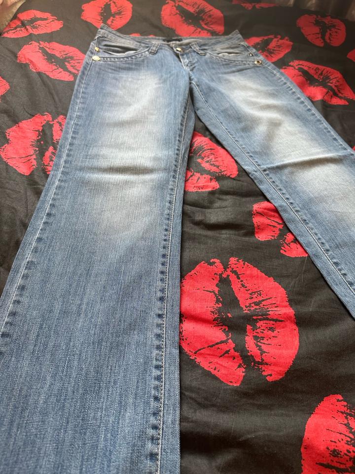 Джинсы Versace