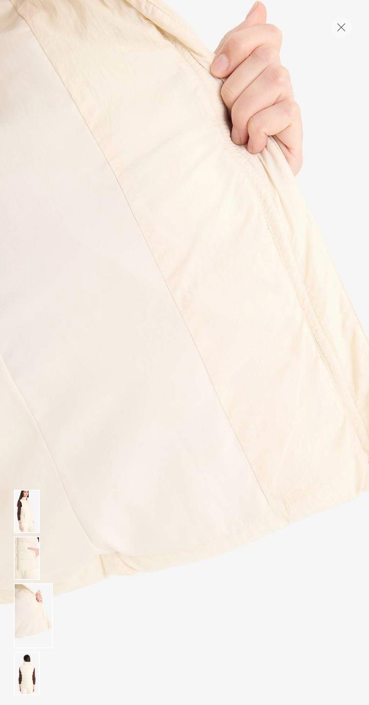 Жилетка безрукавка