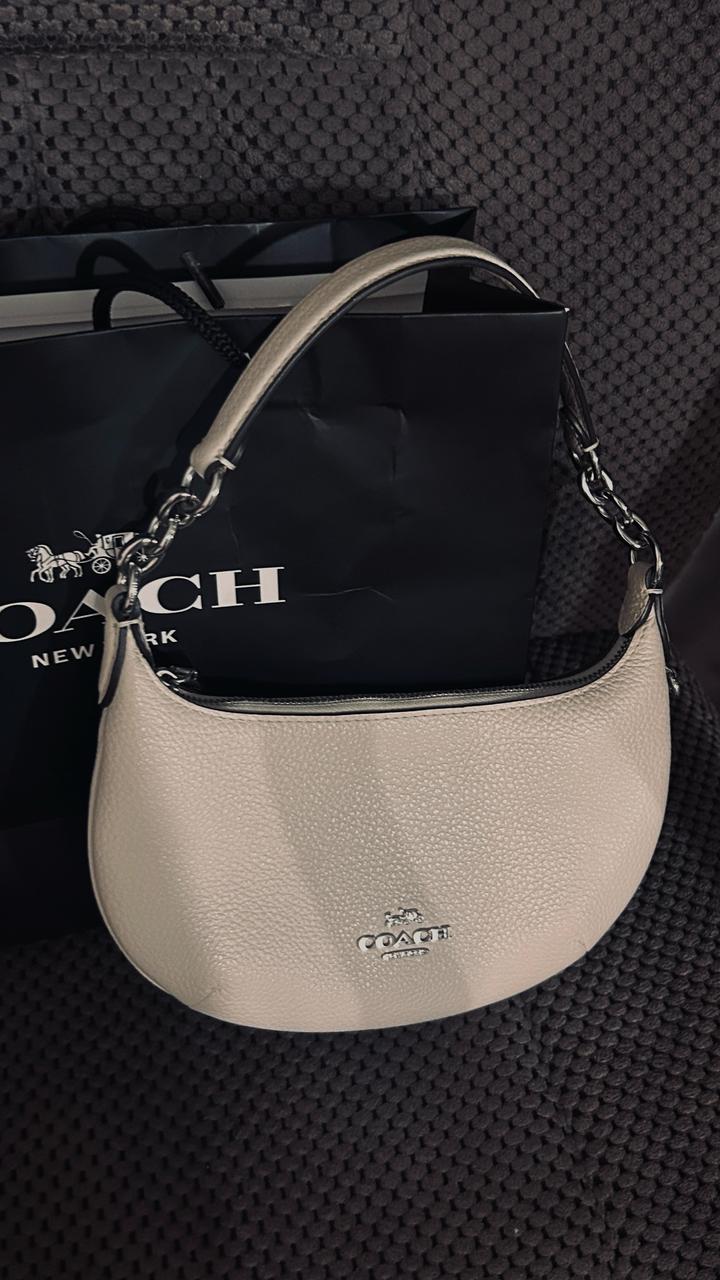 Белая сумка Coach