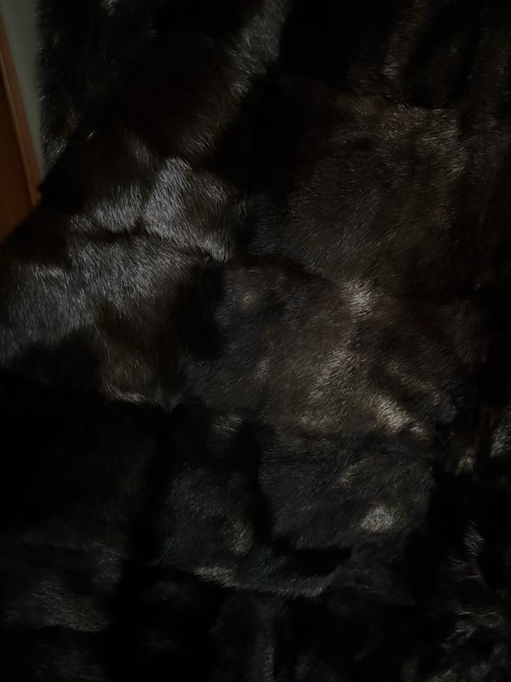 Новая шуба черного цвета