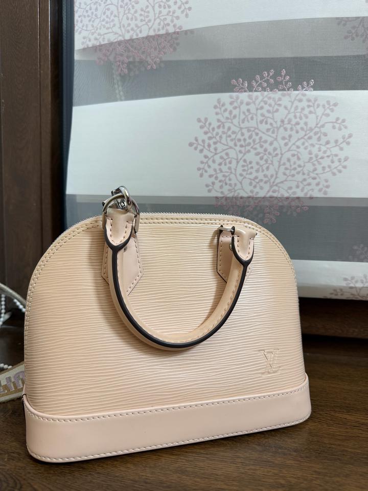 Розовое сумка Louis Vuitton