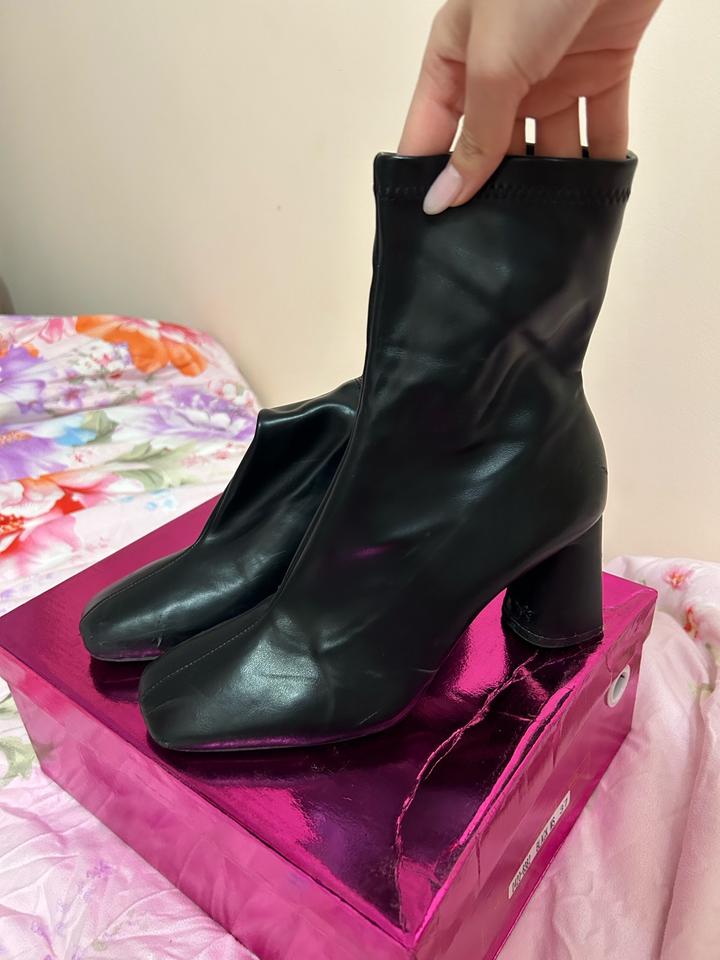 Сапоги на каблуках