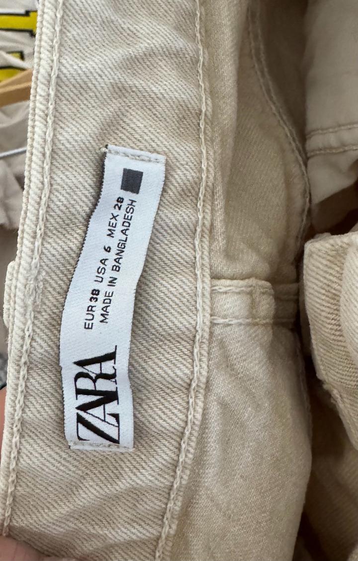 Бежевые джинсы ZARA