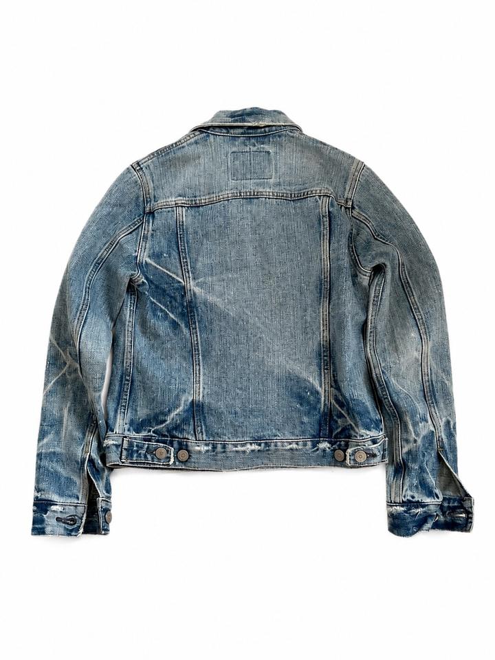 Distressed denim jacket