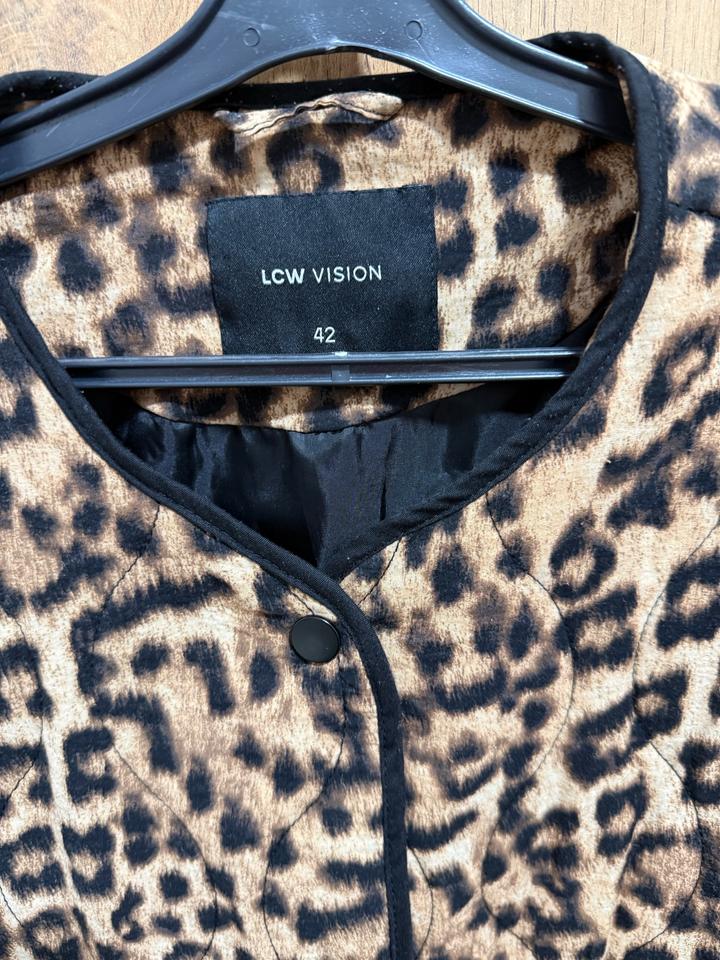 Стеганный бомбер