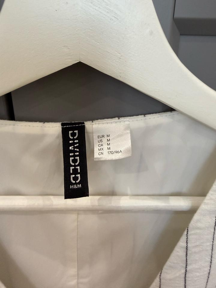 Продам льняную жилетку H&M