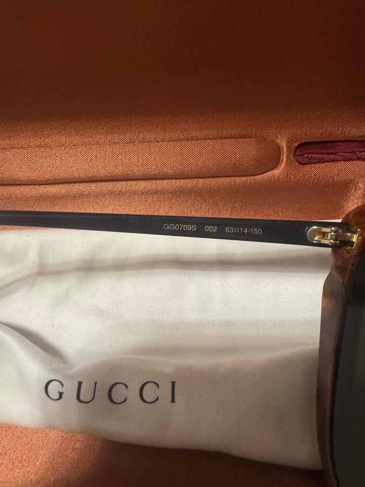 Солнцезащитные очки Gucci