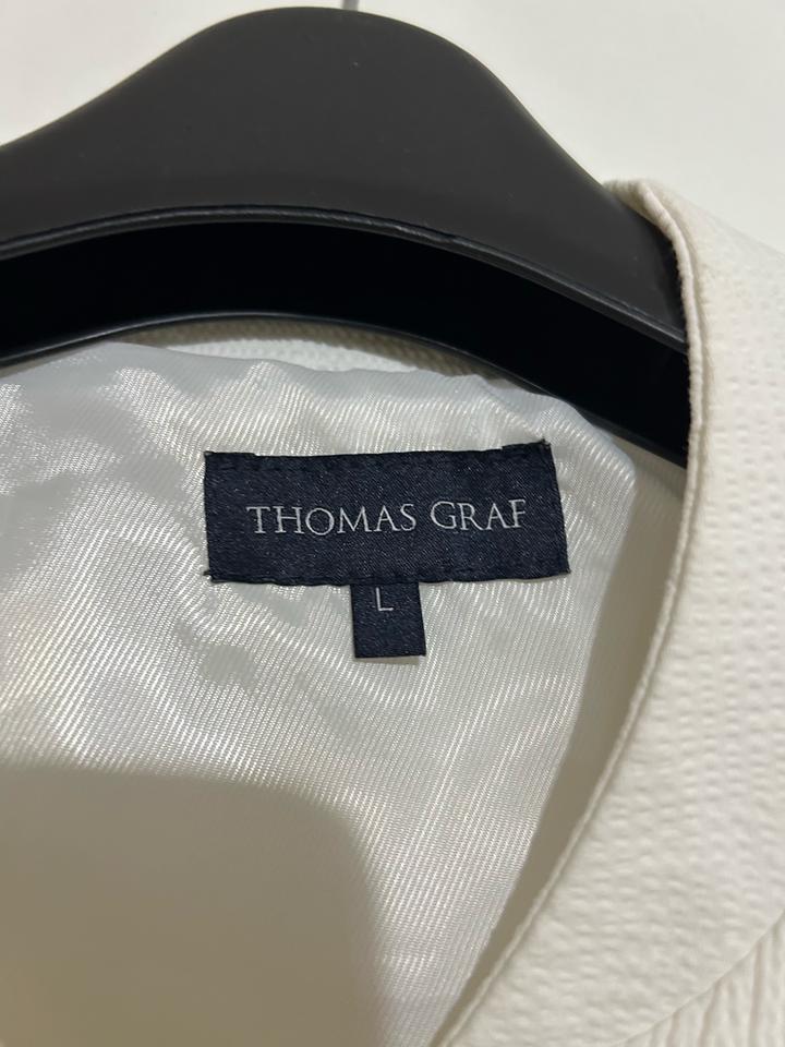 Бомбер от бренда Thomas Graf