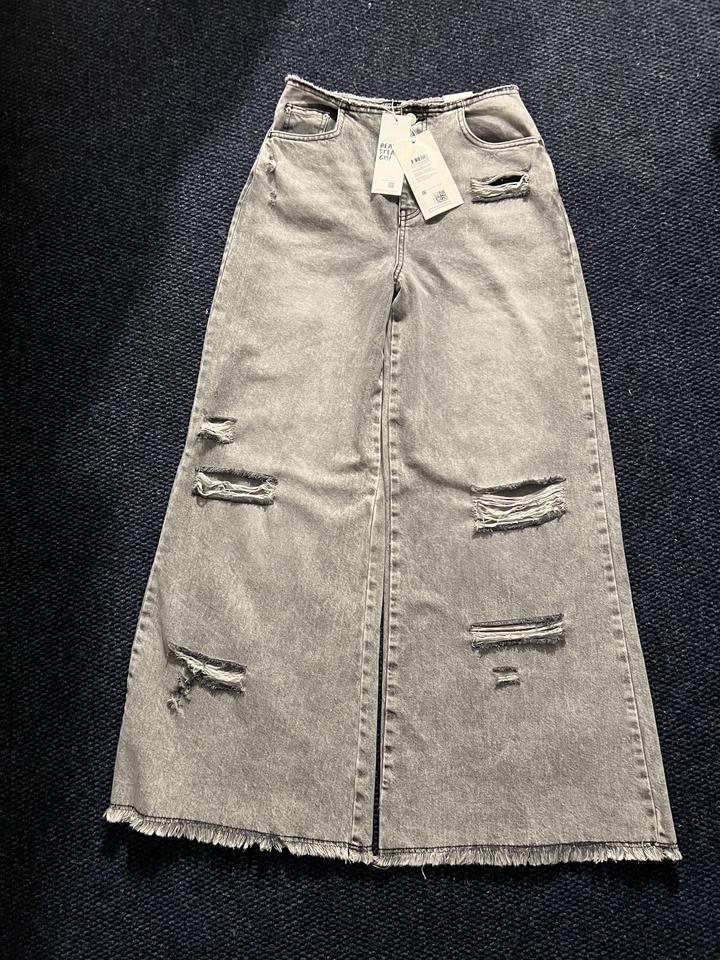 джинсы серые с разрезами