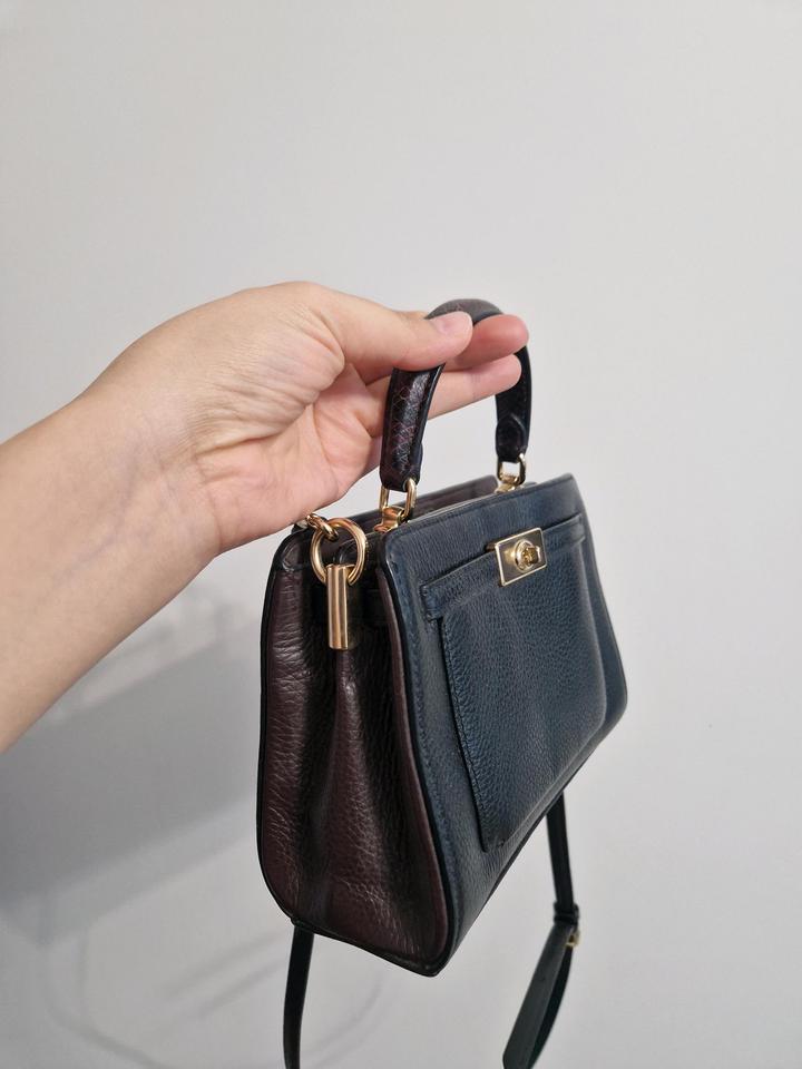 Чёрная сумочка от Coach