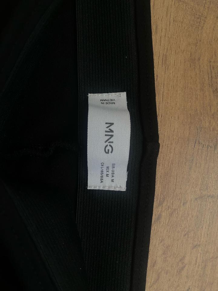 Брюки клеш Манго