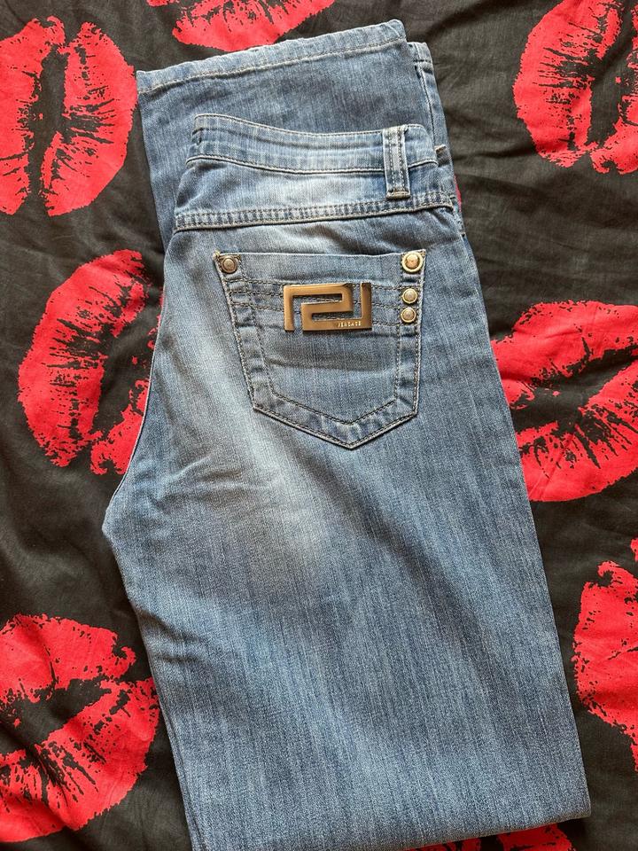 Джинсы Versace