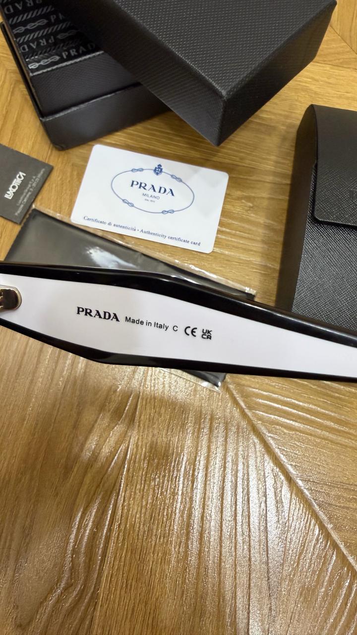 Солнцезащитные очки Prada