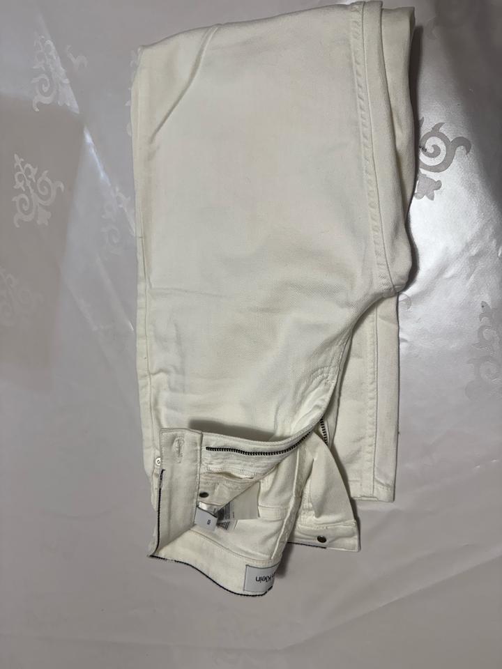 Белые джинсы Calvin Klein