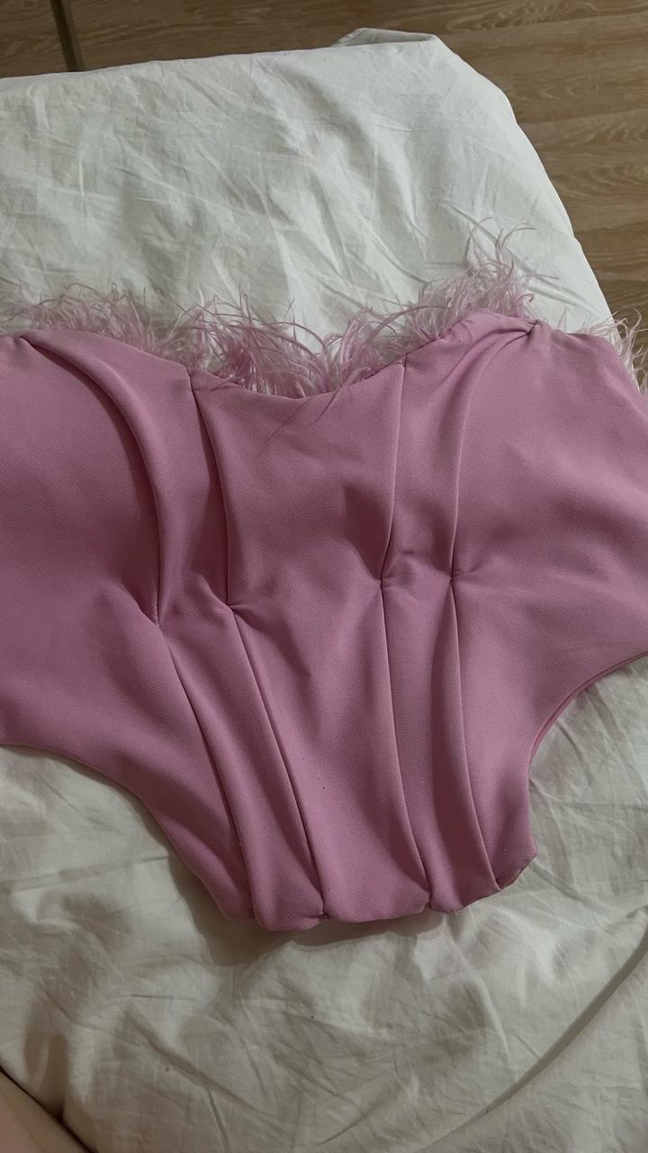 Новый корсет розовый с перьями