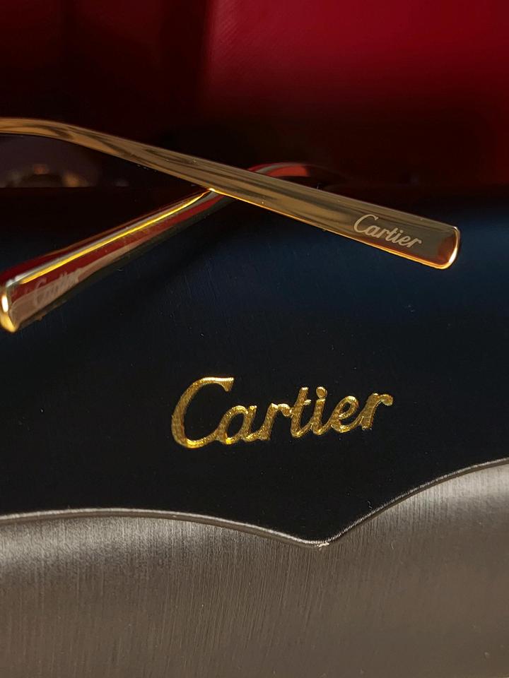 Солнцезащитные очки Cartier