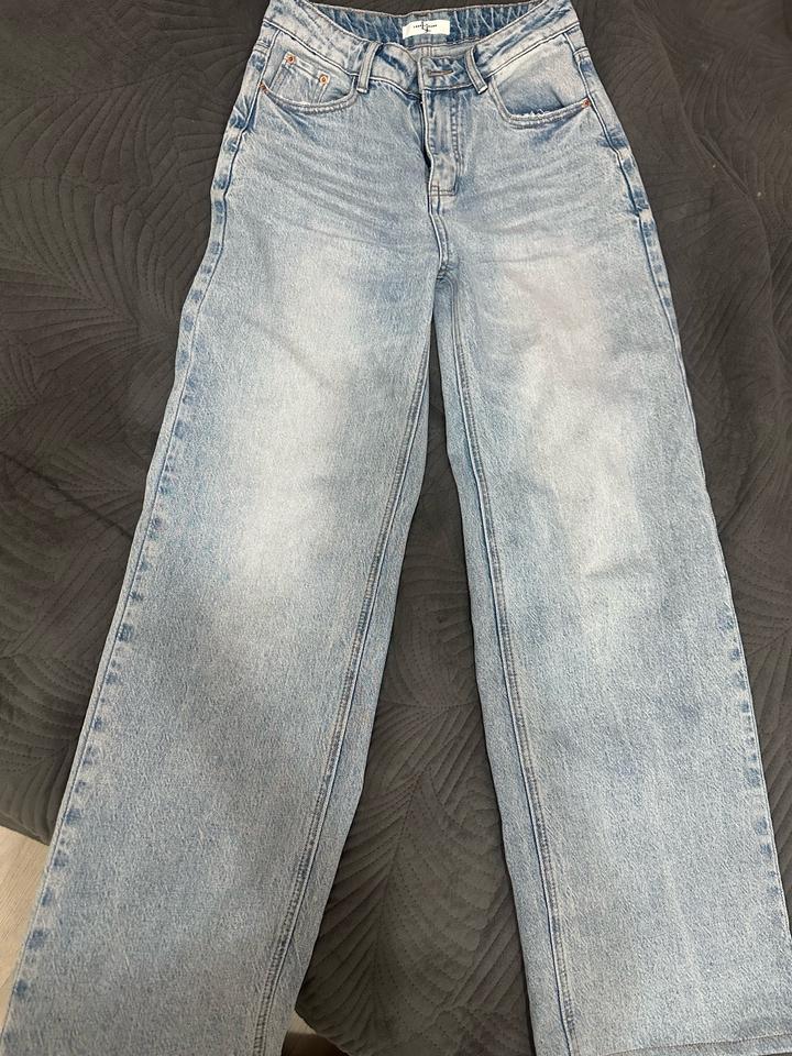 Джинсы новые