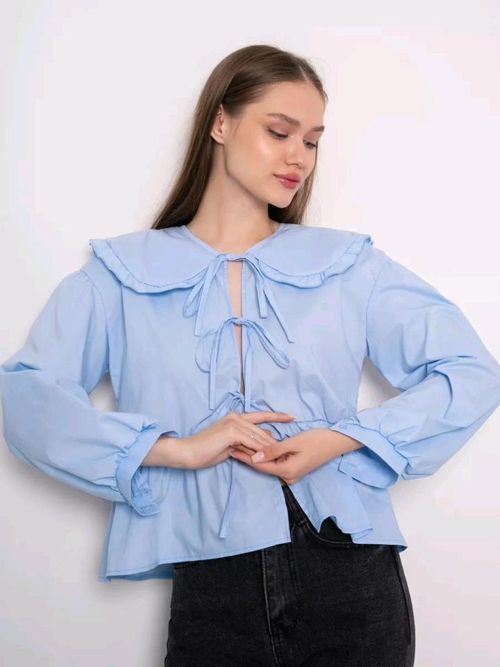 Блузка с бантиками