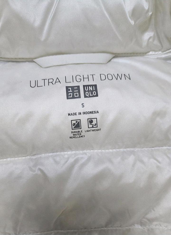 Белая жилетка Uniqlo